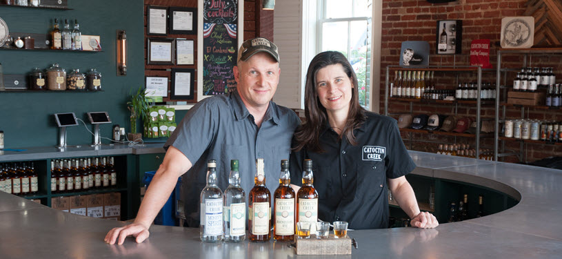 Catoctin Creek Distillery Owners Becky and Scott Harris at Bar