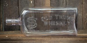 M. C. Beam and Co. Distillery - Old Trump Whiskey Bottle, c.1900