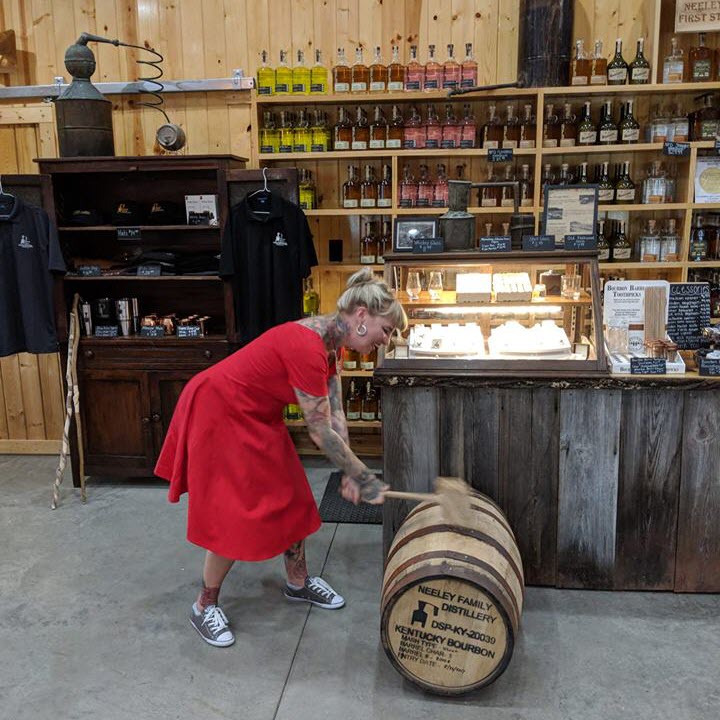 Neeley Family Distillery - Molly Wellmann Hammers Home the Bung