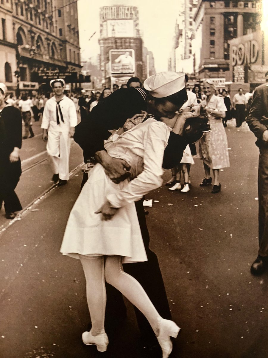 The Kiss - Picture of a Sailor Kissing a Nurse in Times Square on the Day WWII Ended with Four Roses Billboard