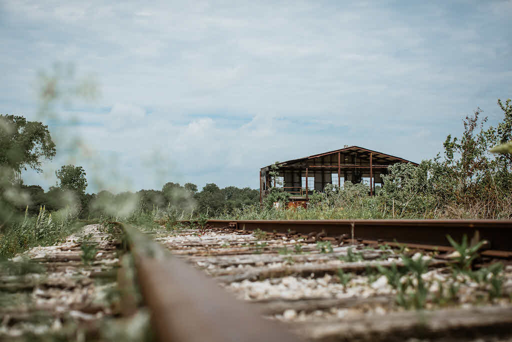 Log Still Distillery - Railroad Tracks Leading to Train Depot