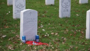 Arlington National Cemetery - A Family Celebrates their Loved Ones with a Couple Cans of Bud