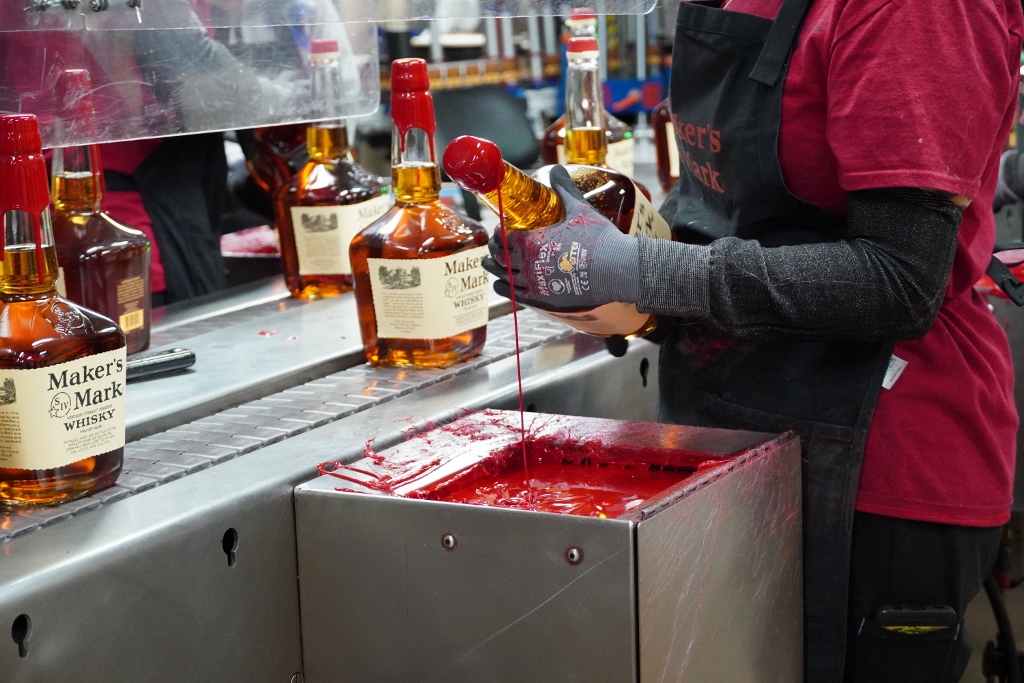 Maker's Mark Distillery - Dipping a Bottle of Maker's Mark into the Red Wax