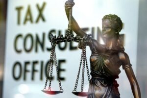 Taxes and the Scales of Justice