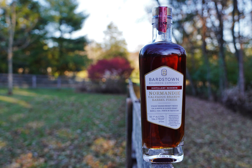 Bardstown Bourbon Company – Distillery Reserve Normandie Calvados Brandy Barrel Finished Bourbon Whiskey Bottle on the Fence