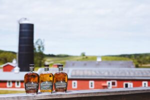 WhistlePig Whiskey Distillery - The Distillery with Bottles of WhistlePig Farmstock Bourbon and Rye Whiskey