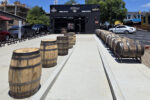 Louisville Rickhouse Whiskey Company - Exterior View with Whiskey Barrels